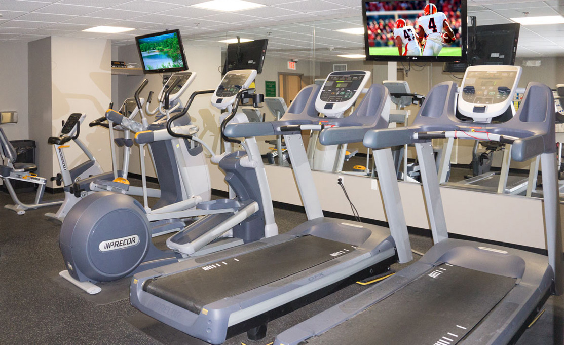 Fitness center at Temple Square Apartments